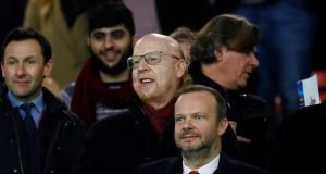 Neville warns Woodward after United fans attack Ed